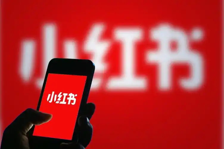 A phone showing a social media app interface, representing Xiaohongshu.